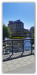 Yellow Riverside Building in Sunlight