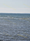 Calm Blue Sea with Small Waves
