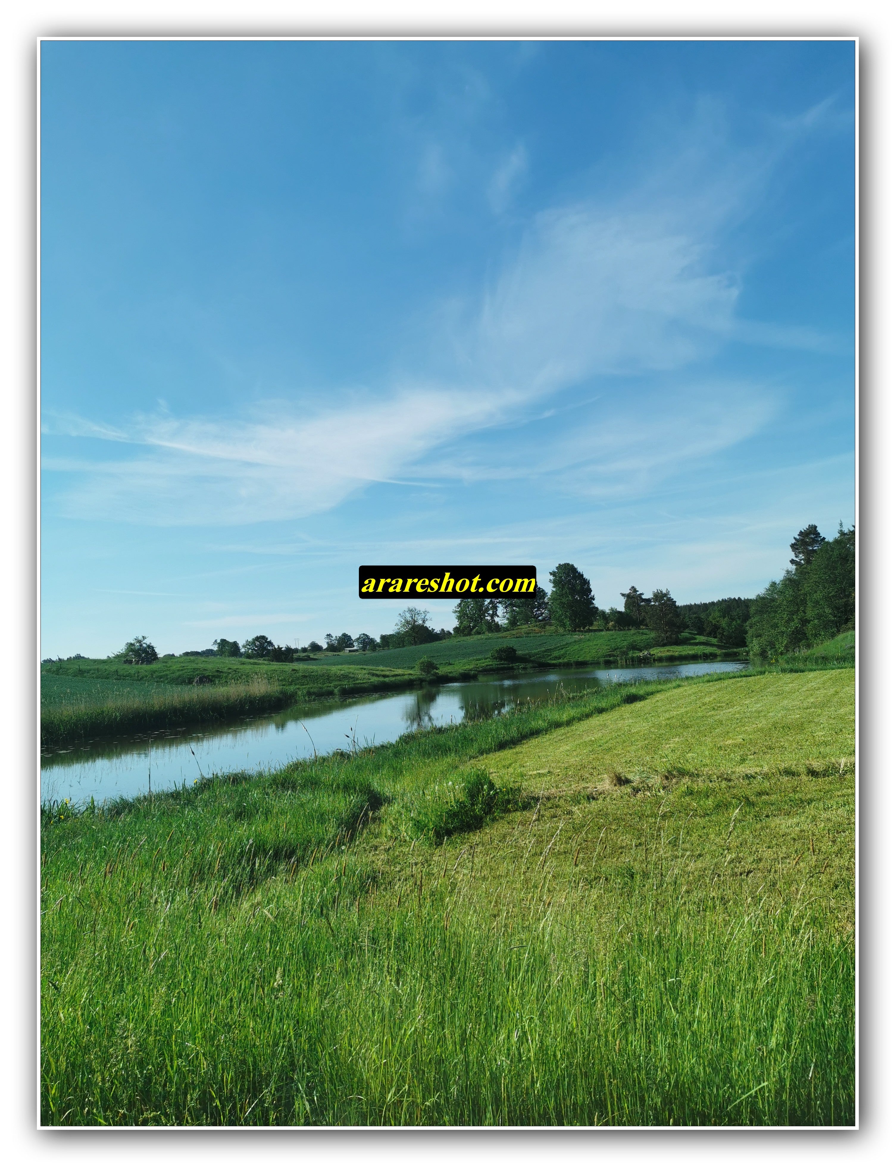 Calm River in Green Countryside