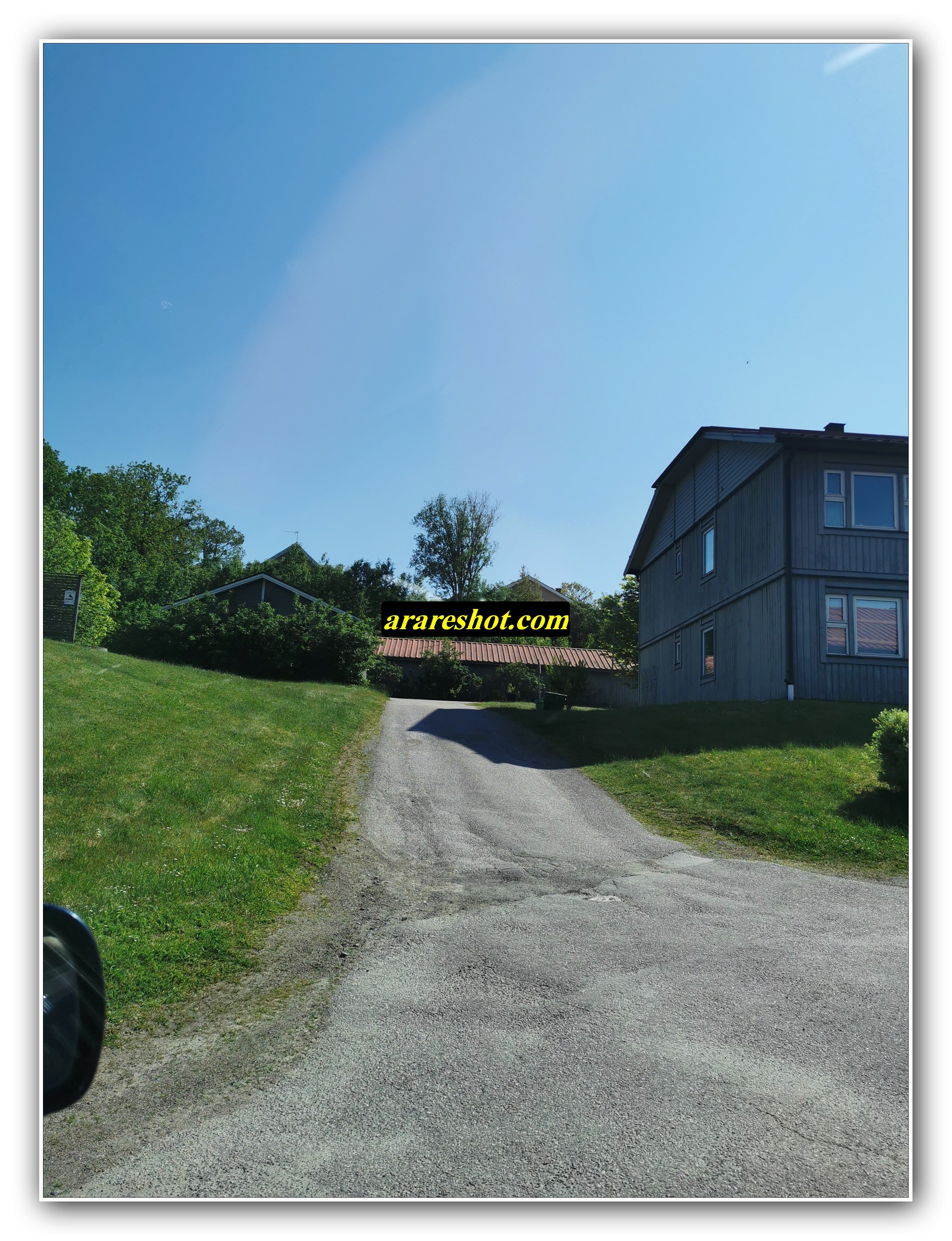 Uphill Driveway in a Quiet Neighborhood