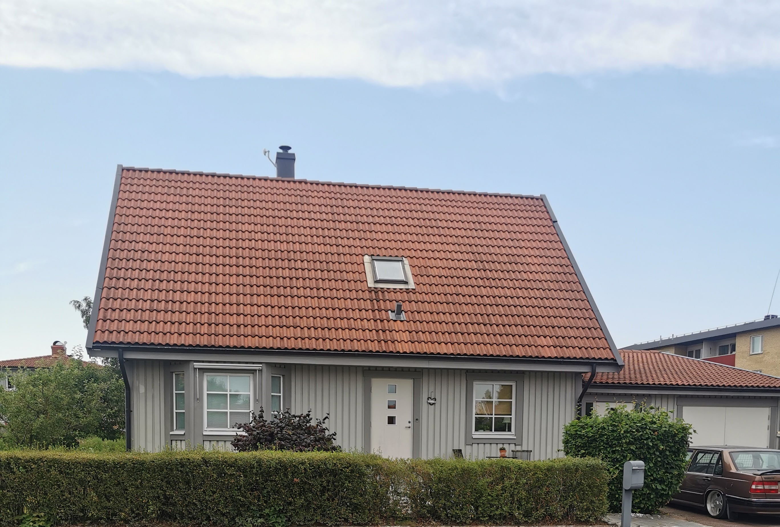 House with Red Tiled Roof and White Door