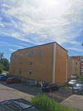 Residential Apartment Building with Parking Lot