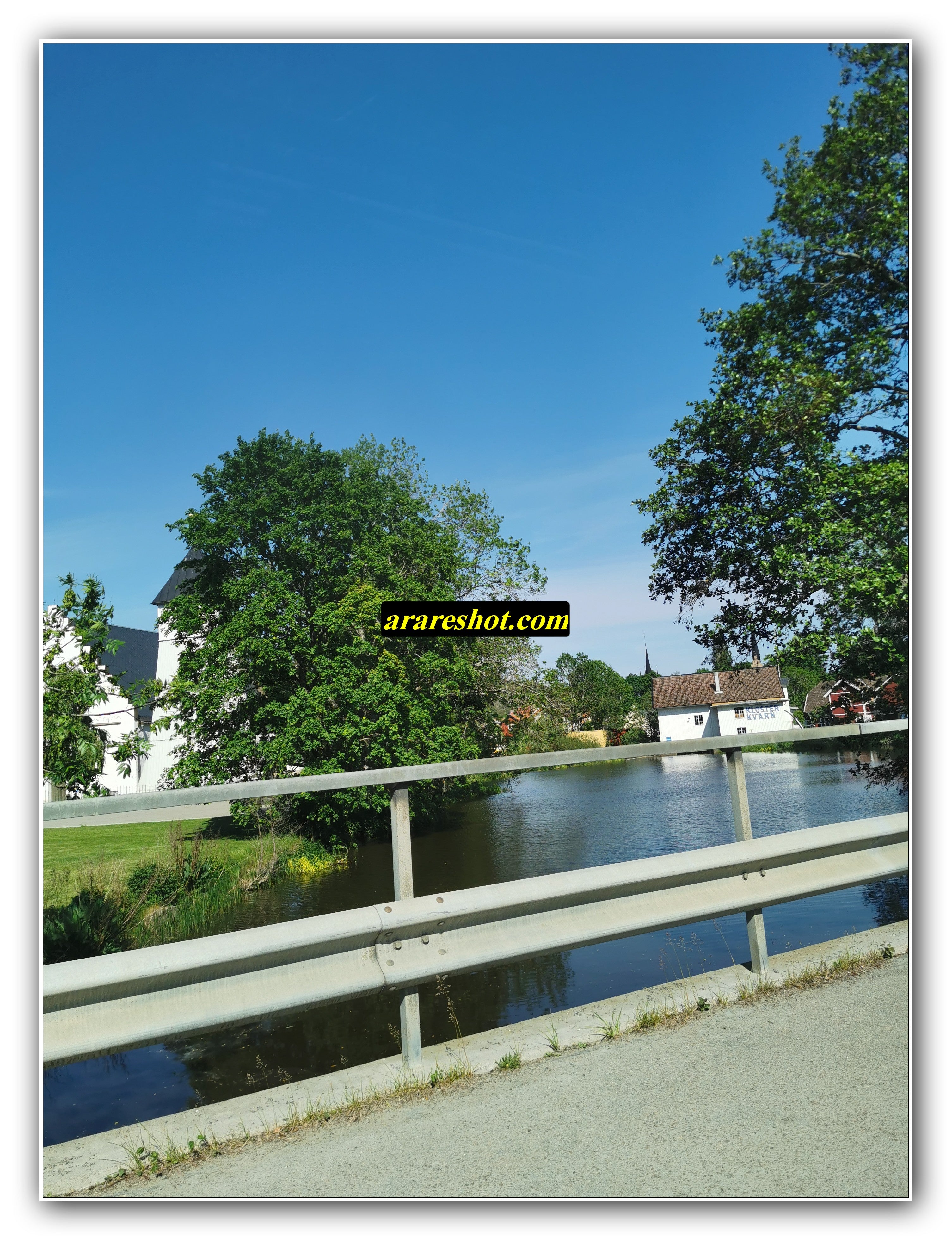 Riverside Village View from a Sunny Bridge Crossing