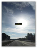 Curved Highway Under Bright Sun