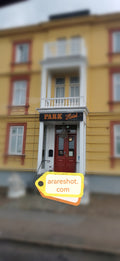 Classic Hotel Entrance with Lion Statues