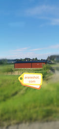 Red Barn in Green Countryside