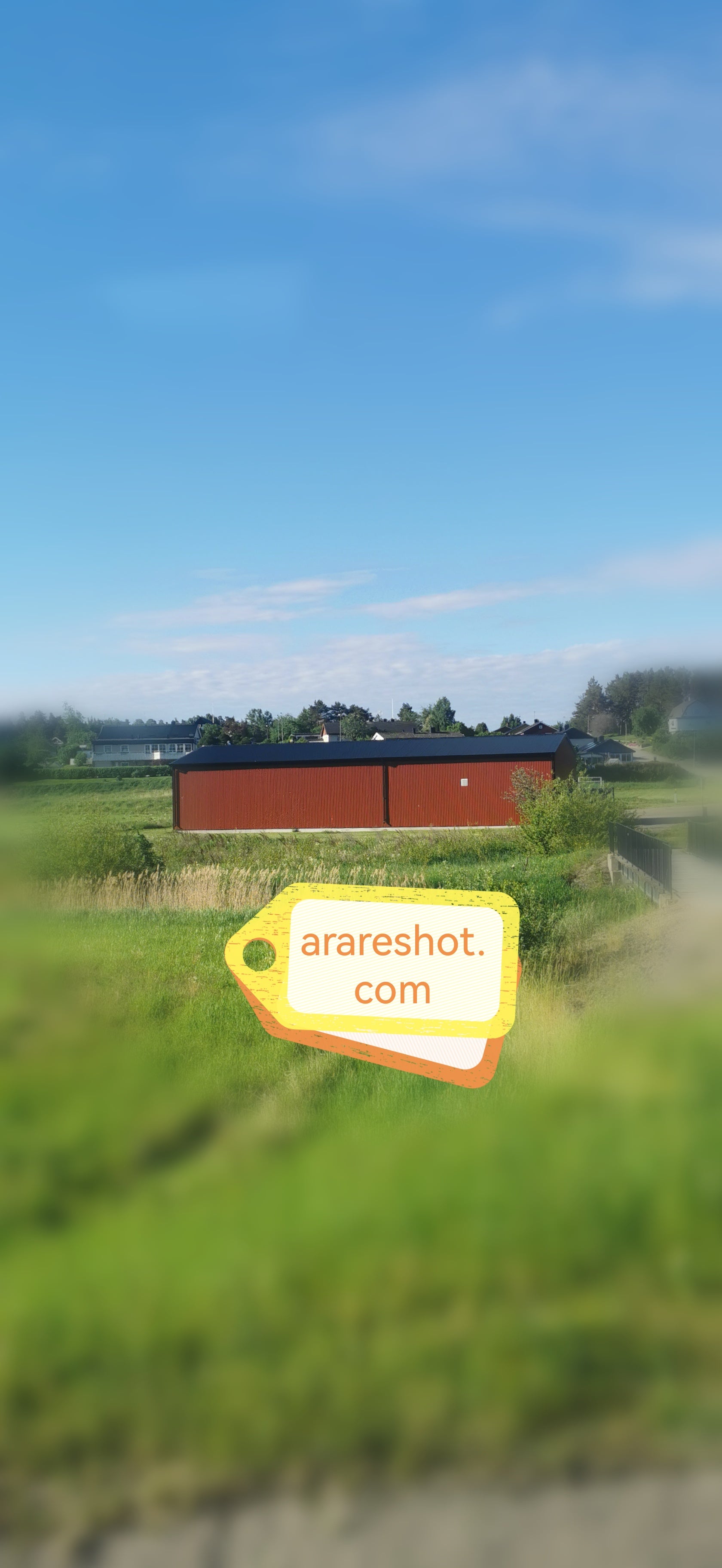 Red Barn in Green Countryside