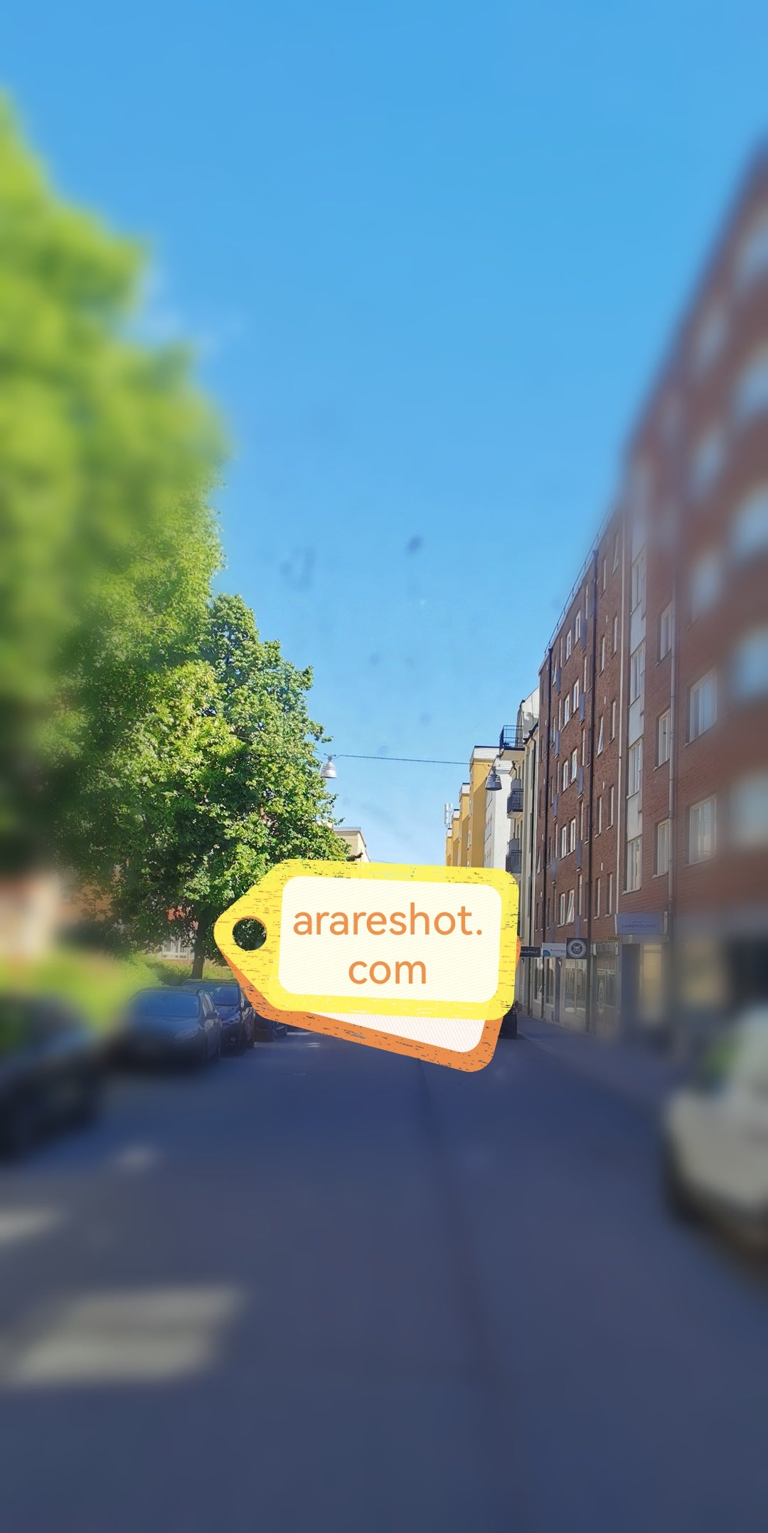 Quiet Residential  Street Under Clear Blue Sky