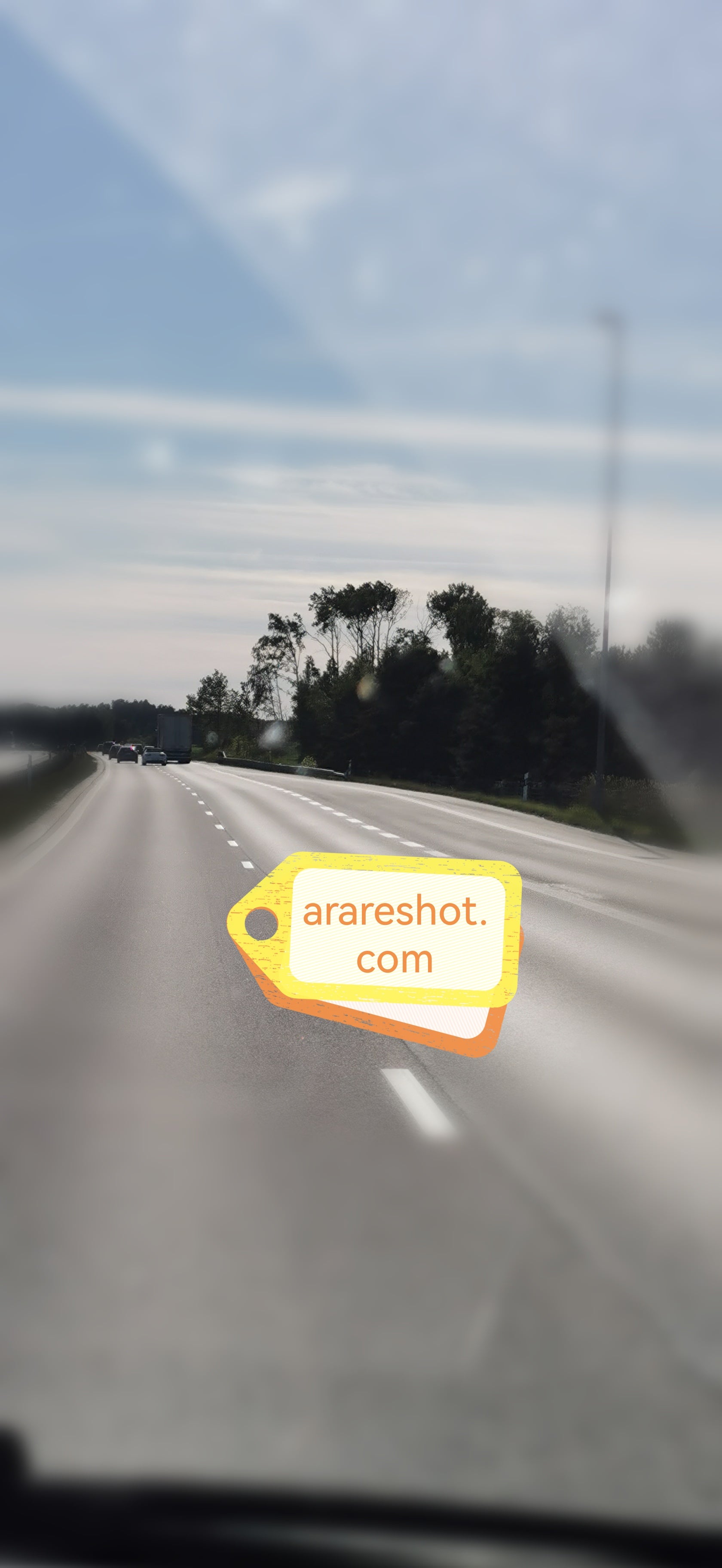Highway Traffic Under Clear  Blue Sky