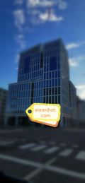 Modern Glass Office Building at Empty Intersection