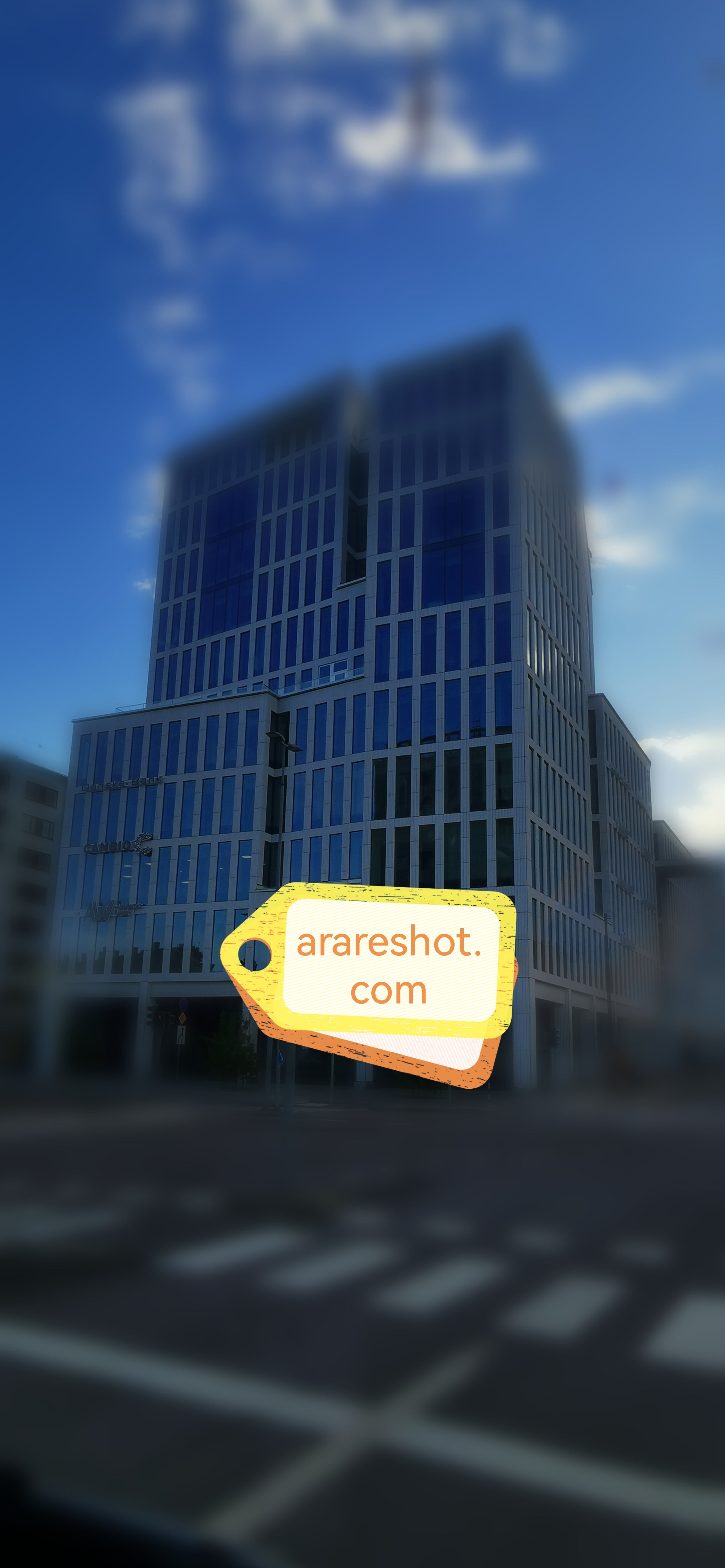 Modern Glass Office Building at Empty Intersection